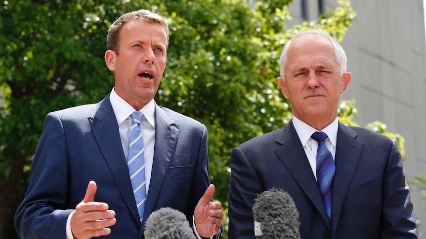 Dan Tehan and Malcolm Turnbull speak at a press conference.