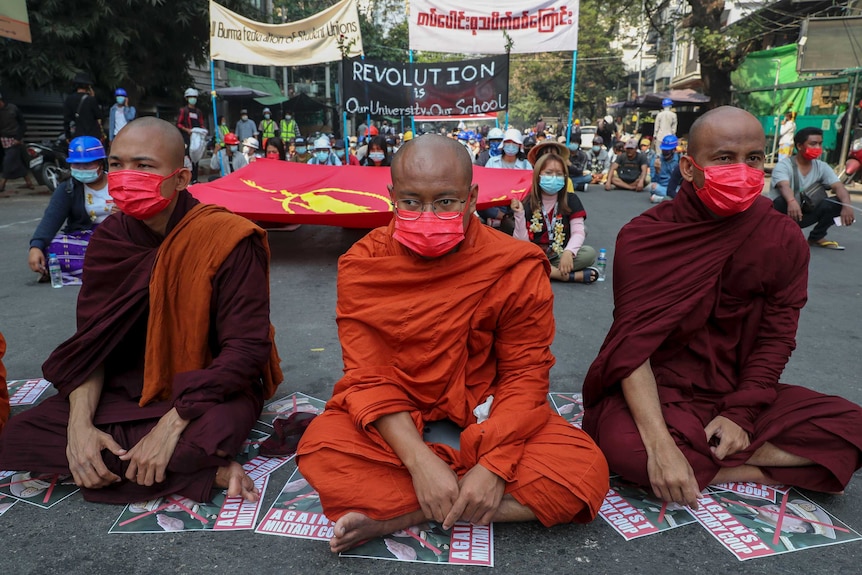 Anti-coup Buddhist monks participate in a demonstration in Mandalay