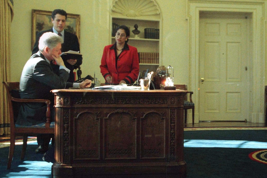 US President Bill Clinton prepares for the State of the Union Address in the Oval office in Washington, DC January 19, 1999.