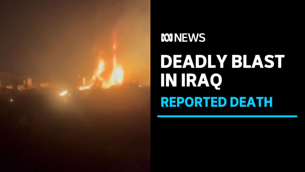 Deadly Blast In Iraq, Reported Death: A blurry photo of a fiery scene.