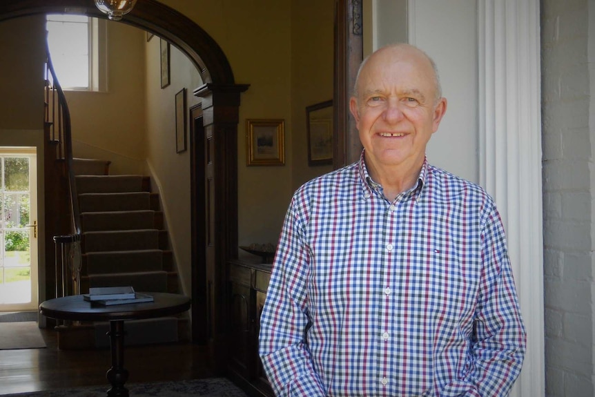 John Pooley in the front door of Prospect House.