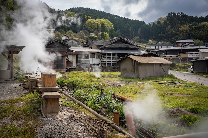 Steam rising from the ground in a village 