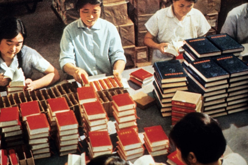 Workers pack boxes of Mao Zedong's The Little Red Book