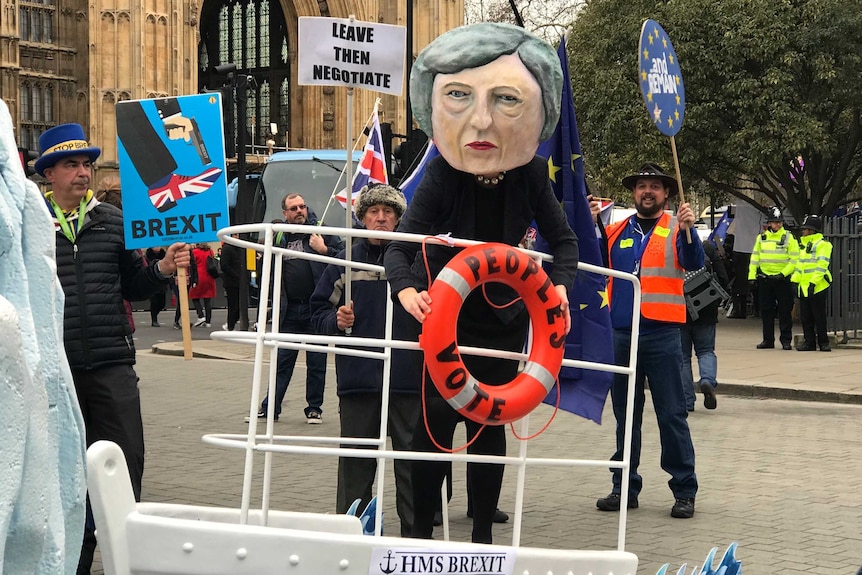 A protester dressed as Theresa May outside of Westminster