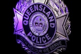 Close-up of Queensland Police Service badge