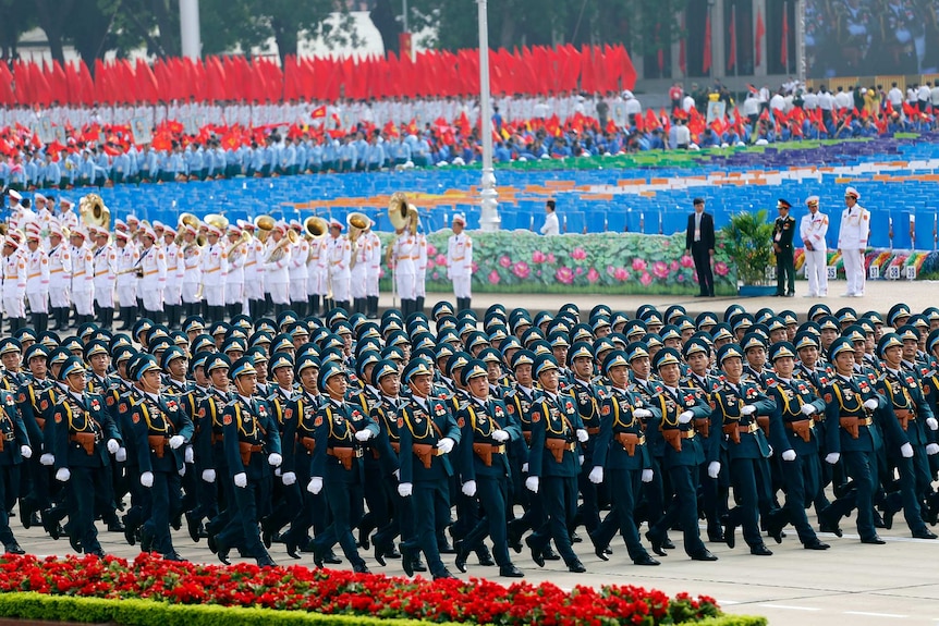 Representatives of the Vietnamese military march in Ba Dinh Square.