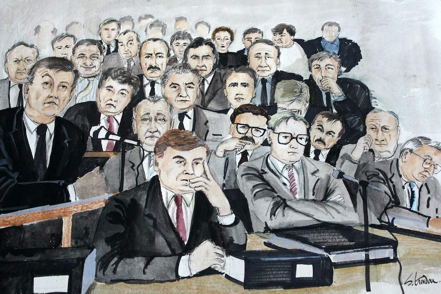 Sketch of 15 or so men sitting in court looking worried and tired