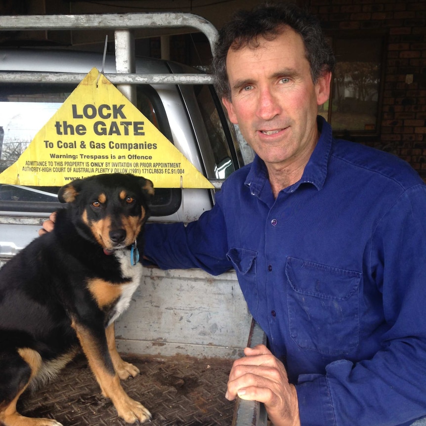 Kalangadoo farmer David Smith stands by his ute, which features a 'lock the gate' sign
