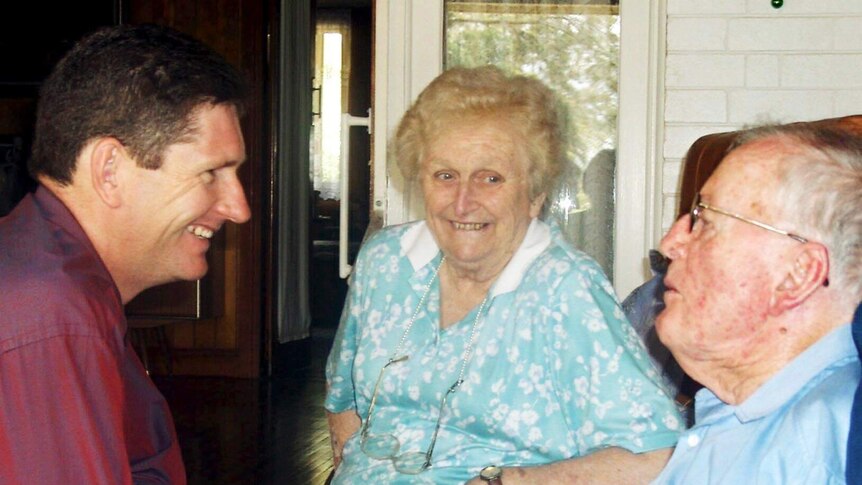 Lawrence Springborg smiles at Sir Joh and wife Lady Florence Bjelke-Petersen
