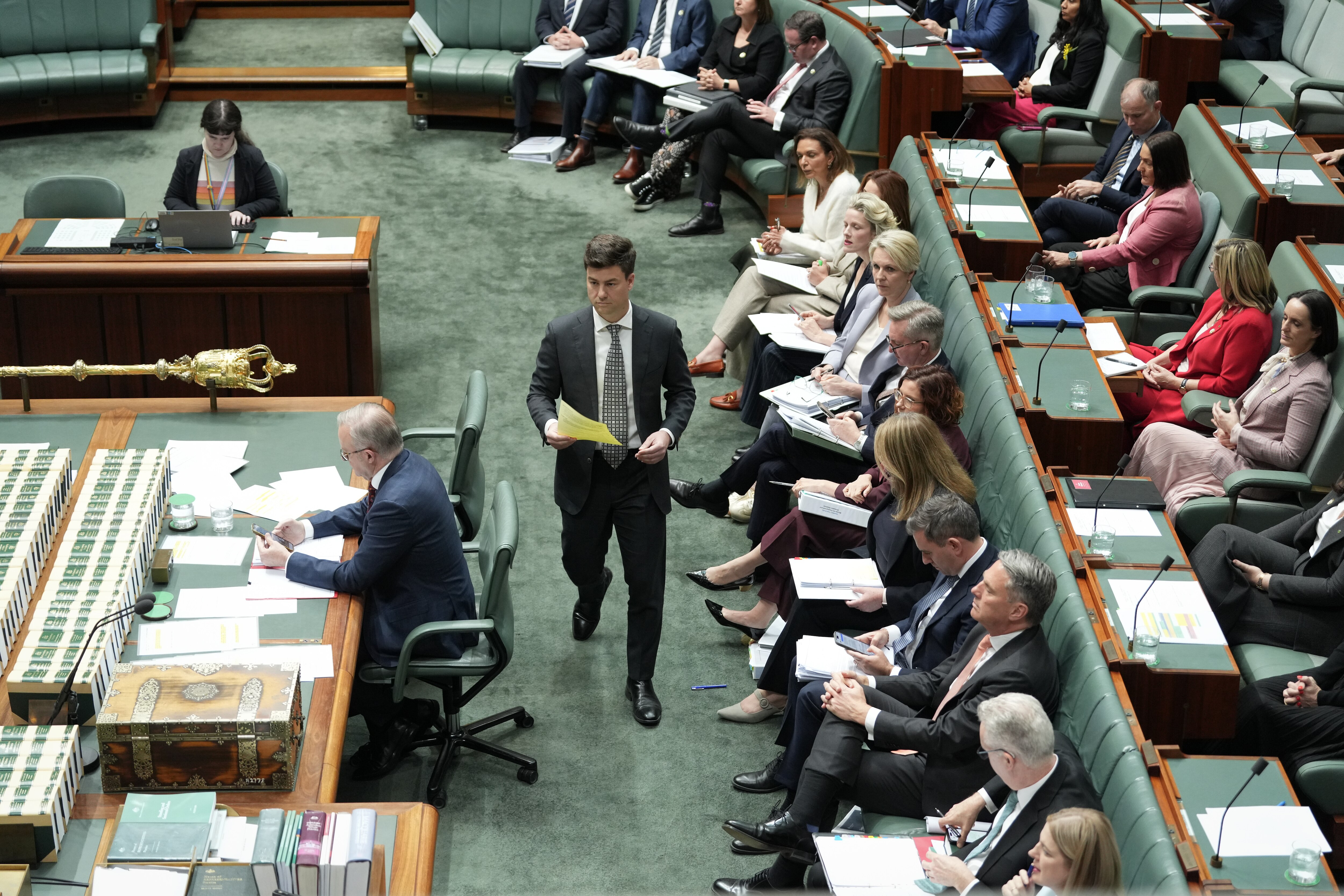 Sam Rae walks to despatch box