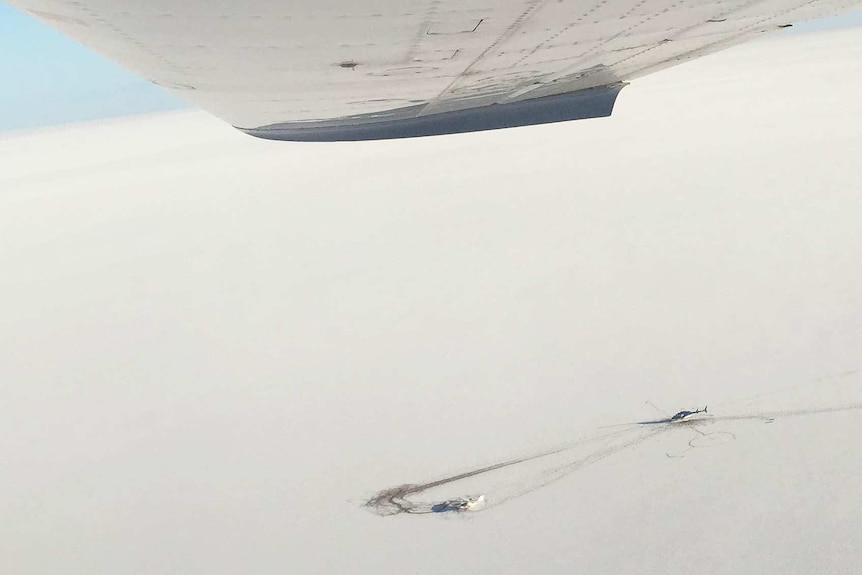 Aerial view of stranded aircraft on Lake Eyre
