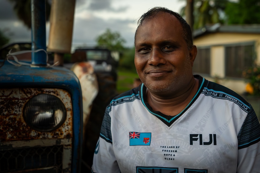 Image of a Fijian man smiling into the camera.