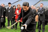 Xi Jinping tries his hand at hurling during a visit this year to Croke Park.