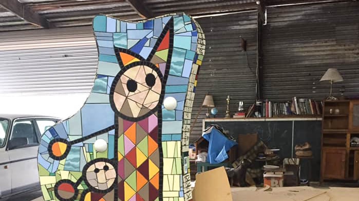 A large colourful tiled sculpture of a kangaroo