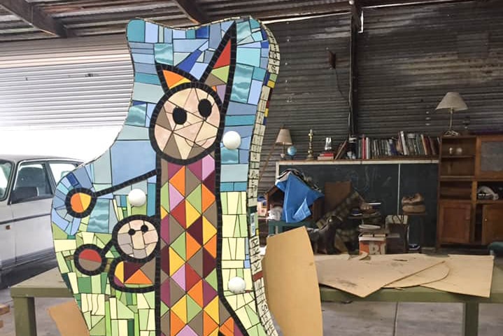 A large colourful tiled sculpture of a kangaroo