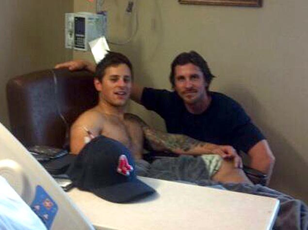 Christian Bale visits shooting victim Carey Rottman in hospital in Aurora, Colorado.