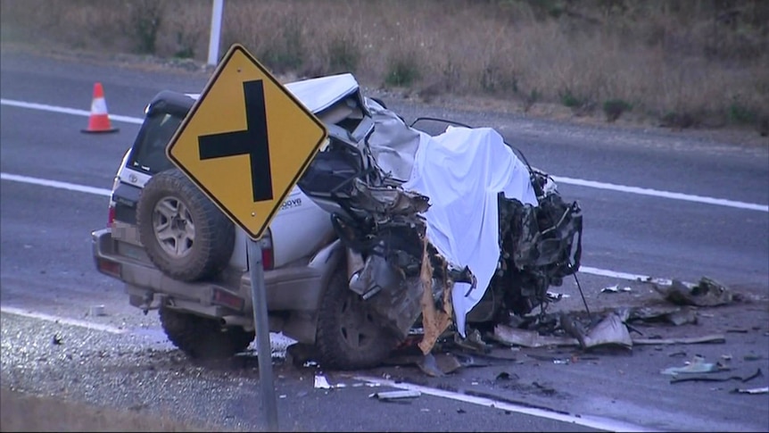 The mangled wreck of a four-wheel drive.