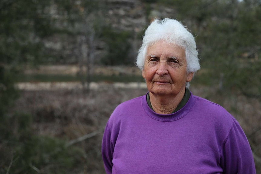 An aboriginal woman at a cultural site