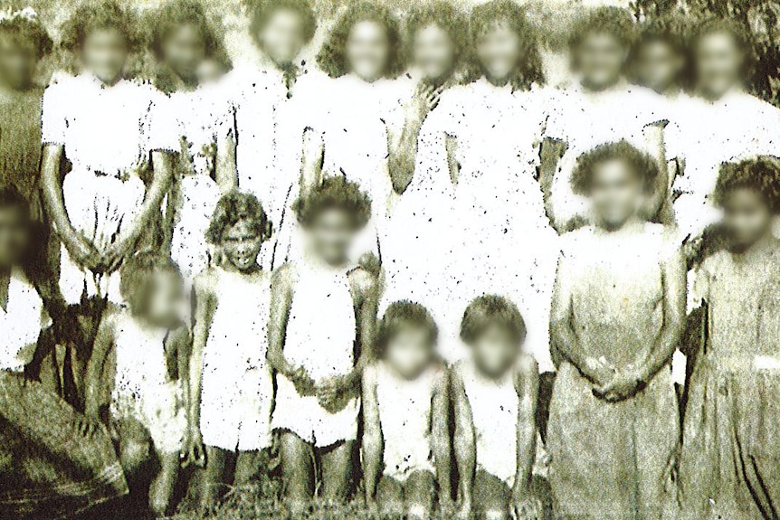 A historic photo of Eileen Cummings at a mission as a child.