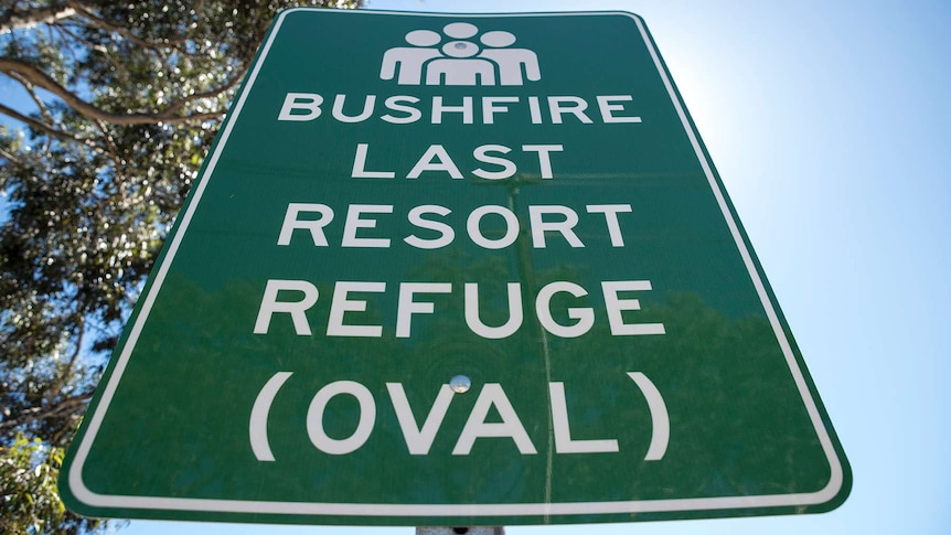 A sign indicating a last resort refuge on a public oval in the event of a bushfire.