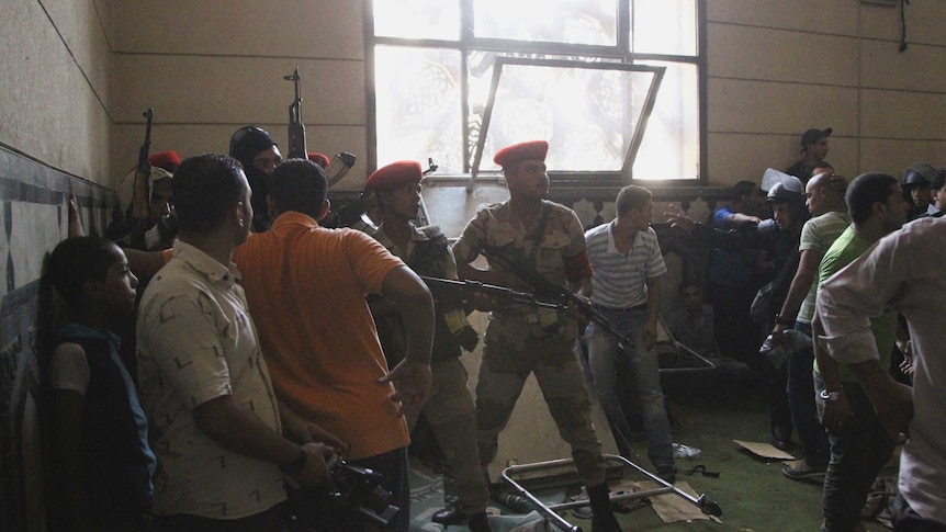 Egyptian soldiers inside a room of the Al-Fath mosque in Cairo
