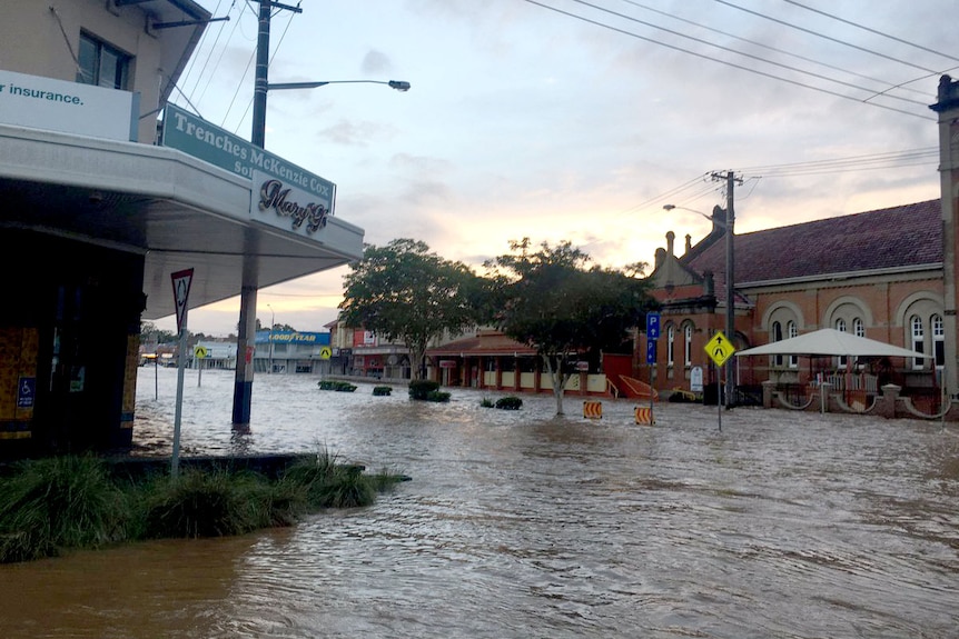 Sun rises over flood waters in Lismore