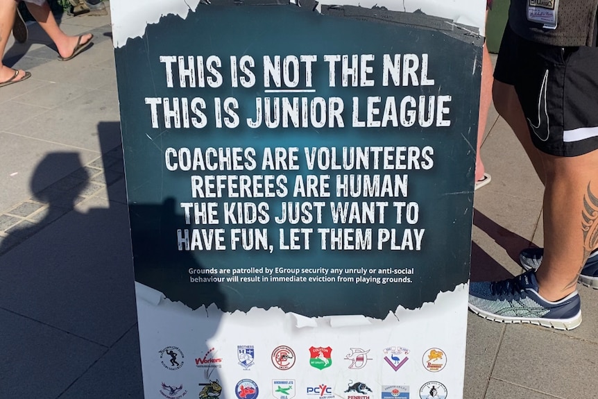 A sign at a junior rugby league match in Penrith that says "This is not the NRL. This is junior league".