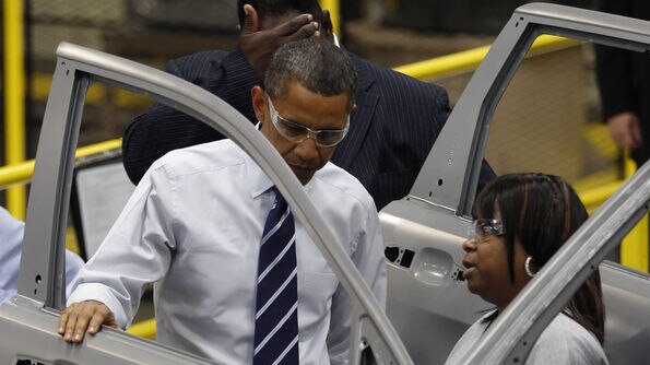 Obama tours auto plant