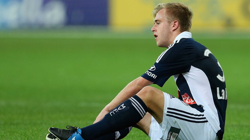 Connor Pain looks dejected after the Melbourne Victory's loss to Perth Glory in round 26.