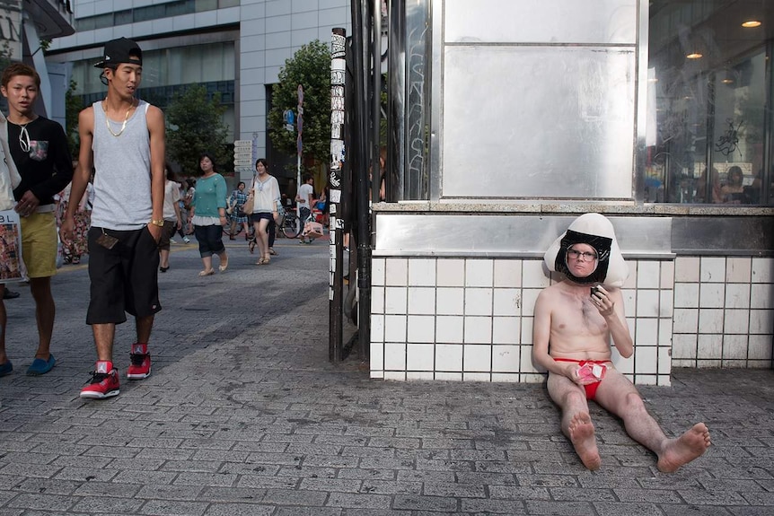 David Elliot-Jones dressed in character on the street in Big In Japan.