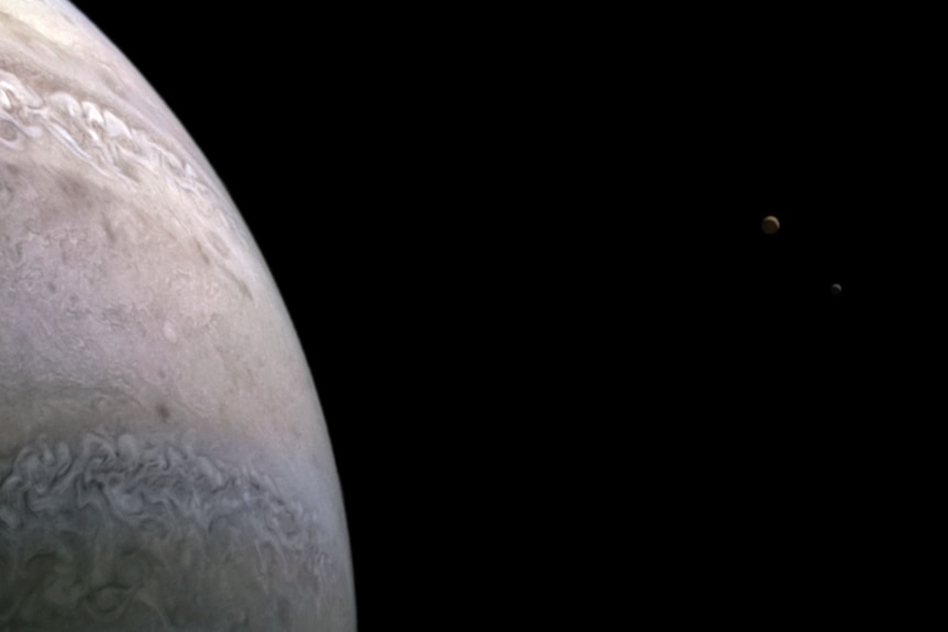 Jupiter with moon Io and Europa