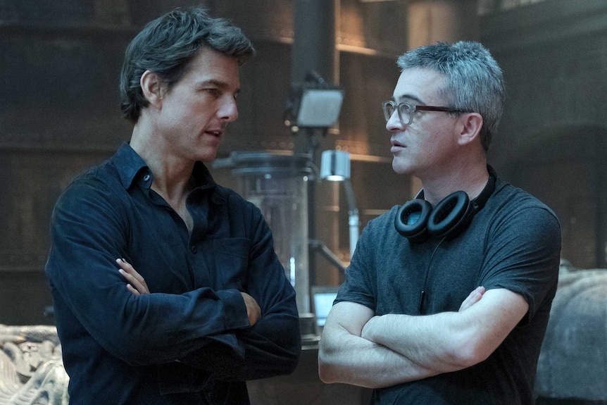 Actor Tom Cruise and director Alex Kurtzman speak on the set of The Mummy movie.