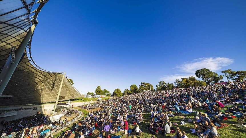 Audience members enjoying the sunshine before an MSO Sidney Myer Music Bowl free concert.