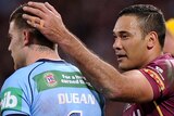 The Maroons' Justin Hodges pats the Blues' Josh Dugan on the head during Origin II, 2013.