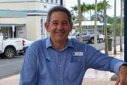 Former CCRC Mayor John Kremastos in a blue shirt posing in a street