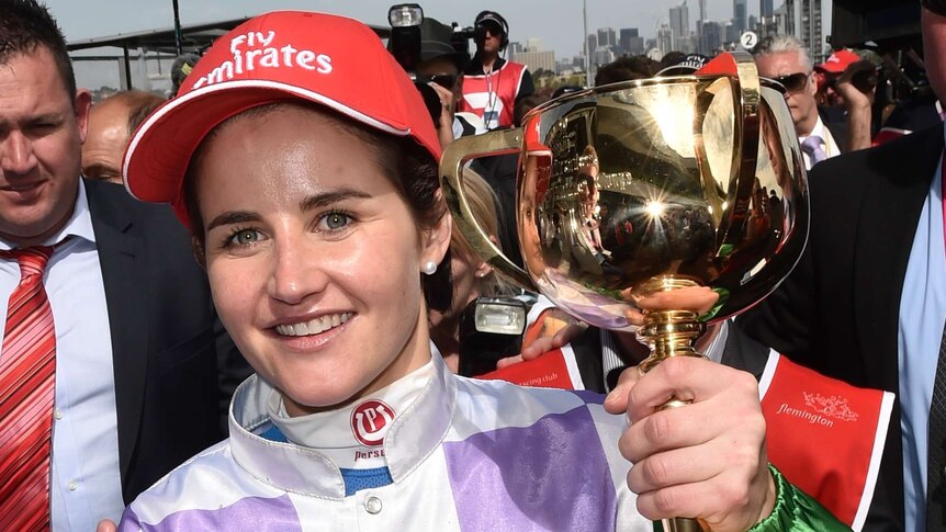 Michelle Payne holds the Melbourne Cup