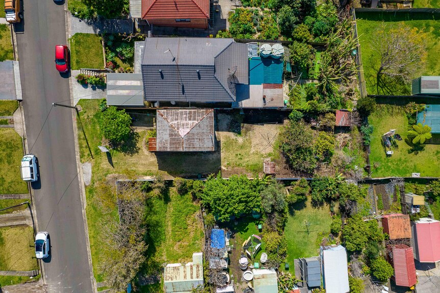 An aerial view of the half house in Warrawong, as seen from a drone looking down