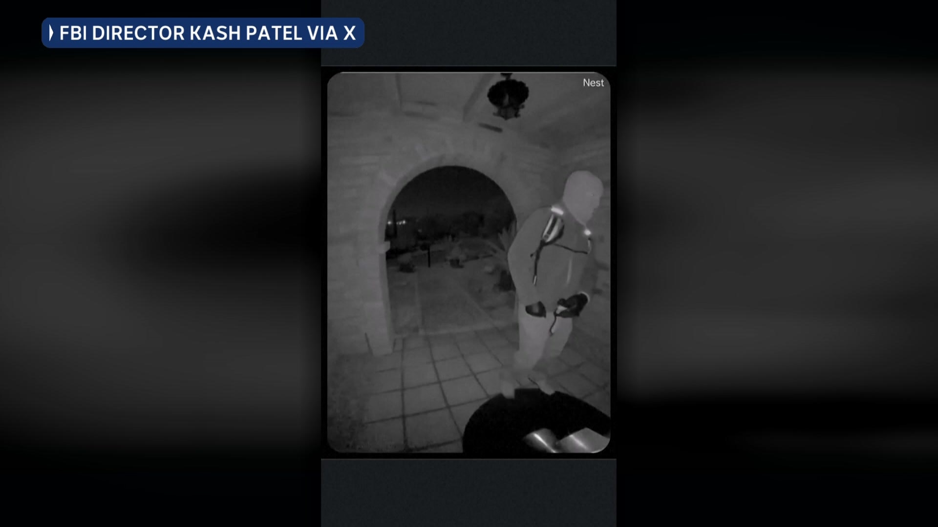 CCTV footage shows a man in a balaclava approaching the front door of a property in the dark