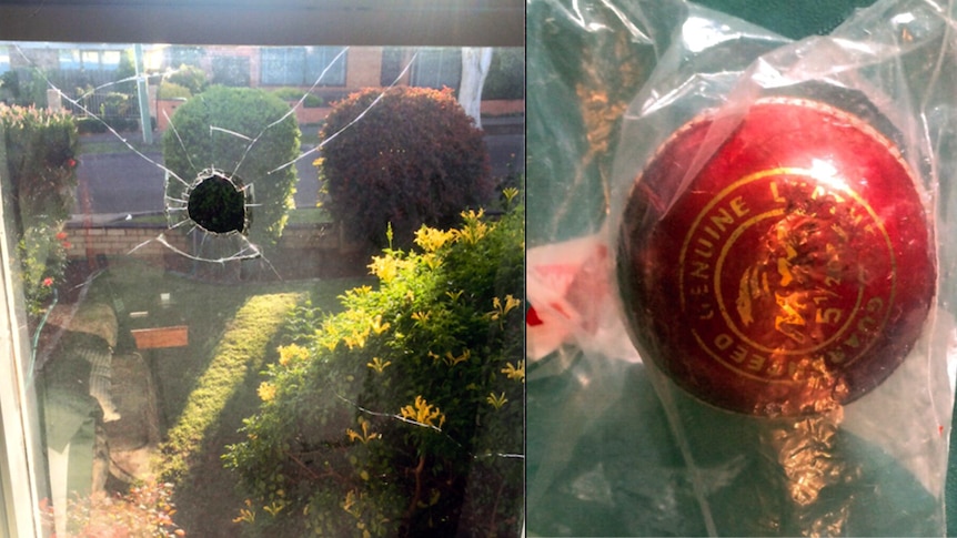 A composite image of a smashed window and a red cricket ball