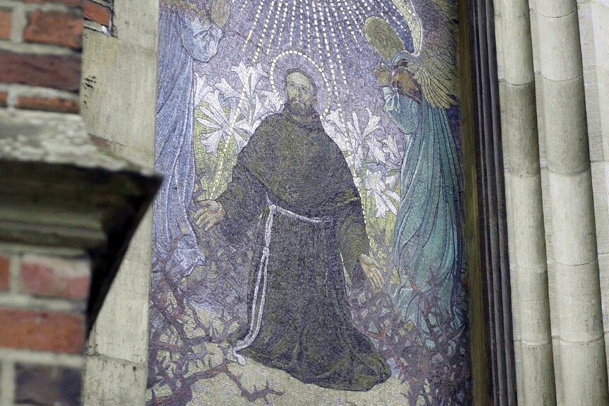 An artwork depicting a Catholic saint.
