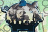 A graphic of a piggy bank with smoking chimneys with dollar notes in the background
