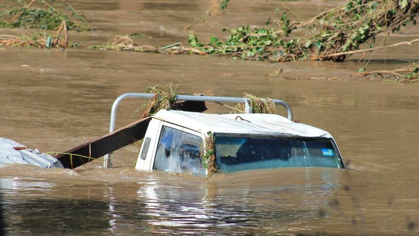 A ute that has been lost in the floods at Stroud