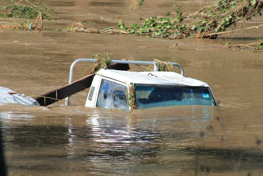 A ute that has been lost in the floods at Stroud