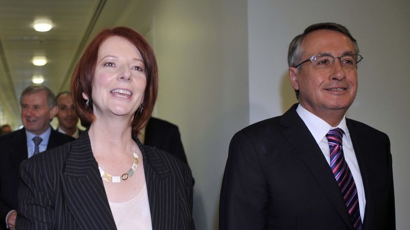 Prime Minister-designate Julia Gillard leaves the ALP leadership meeting