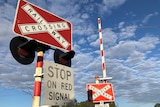 signs for a level crossing