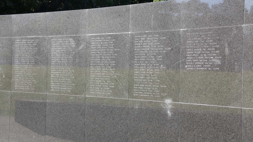 Scratches on the NSW Police Force Wall of Remembrance in Sydney