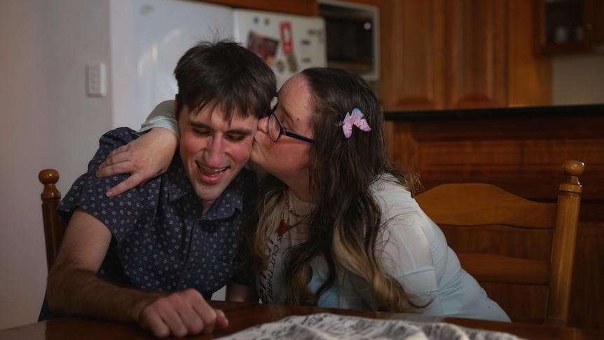Rebecca Preedy kisses her fiance Mitchel Davidson