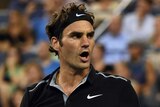 Federer celebrates against Bautista Agut