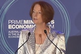 Julia Gillard has urged businesses and unions to spruik the economy.