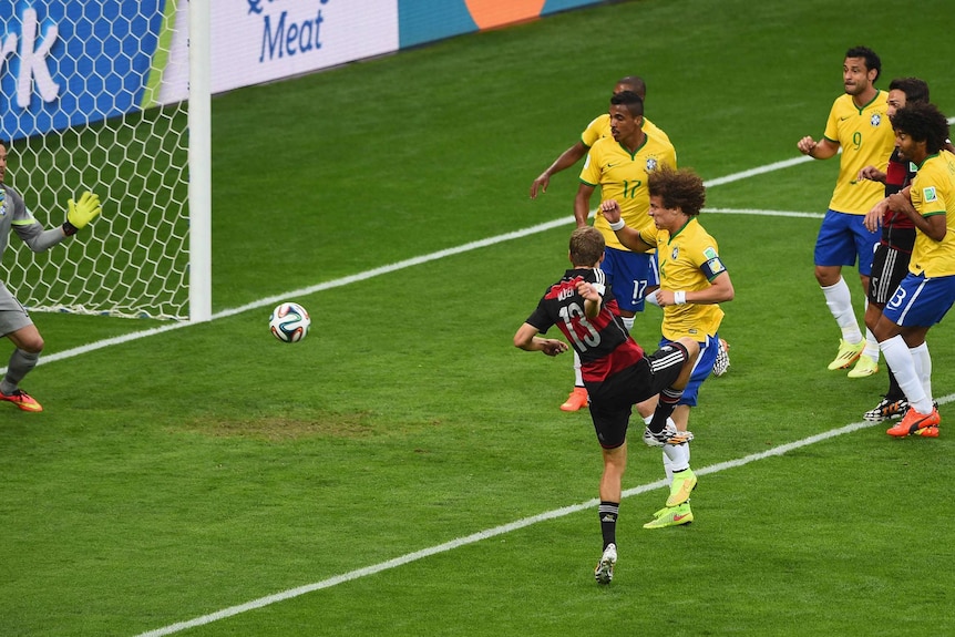 Thomas Muller of Germany scores against Brazil in the World Cup semi-final on July 8, 2014